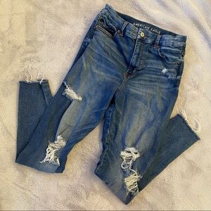 Distressed AE skinny jeans